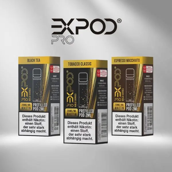 Drei Verpackungen der EXPOD Pro Gold Series Pods in den Sorten Black Tea, Tobacco Classic und Espresso Macchiato nebeneinander vor grauem Hintergrund mit EXPOD Pro Logo darüber.